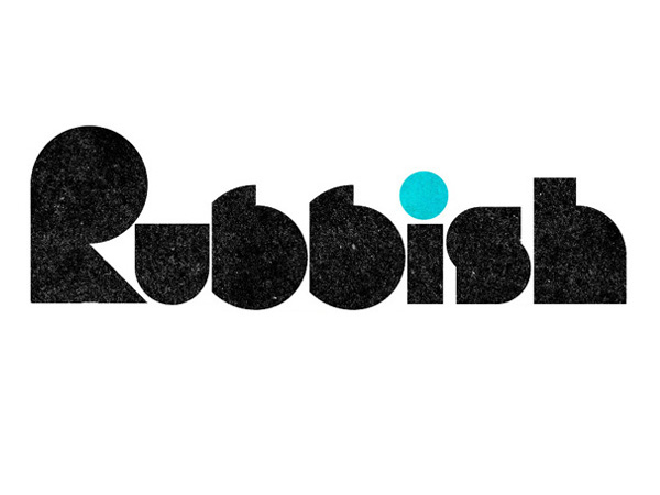 rubbish logo in black with the point over the I letter in blue