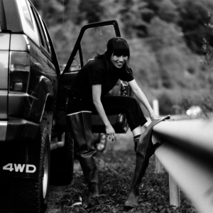 Jumi Kim wearing tall boots