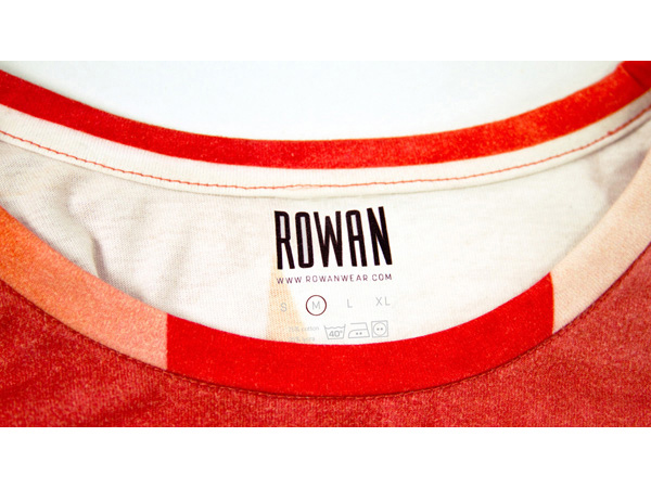 rowan clothing logo on the inside of the collar of a red t-shirt