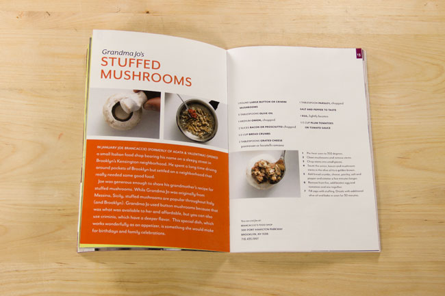 a cooking book opened on the stuffed mushroom recipe