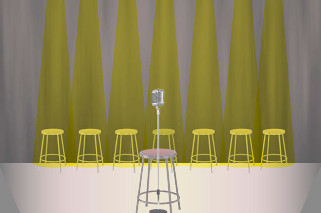 a mic sit in the front and a row of chairs highlighted with yellow lights in theback