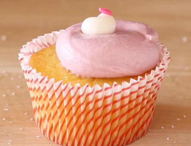 close-up of a cupcake with a pink topping