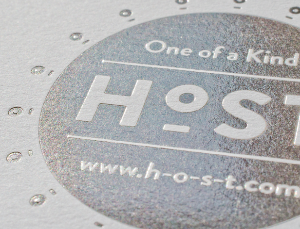 host logo in silver on a hard paper