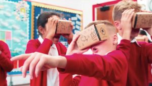 students engaging with cardboard binoculars