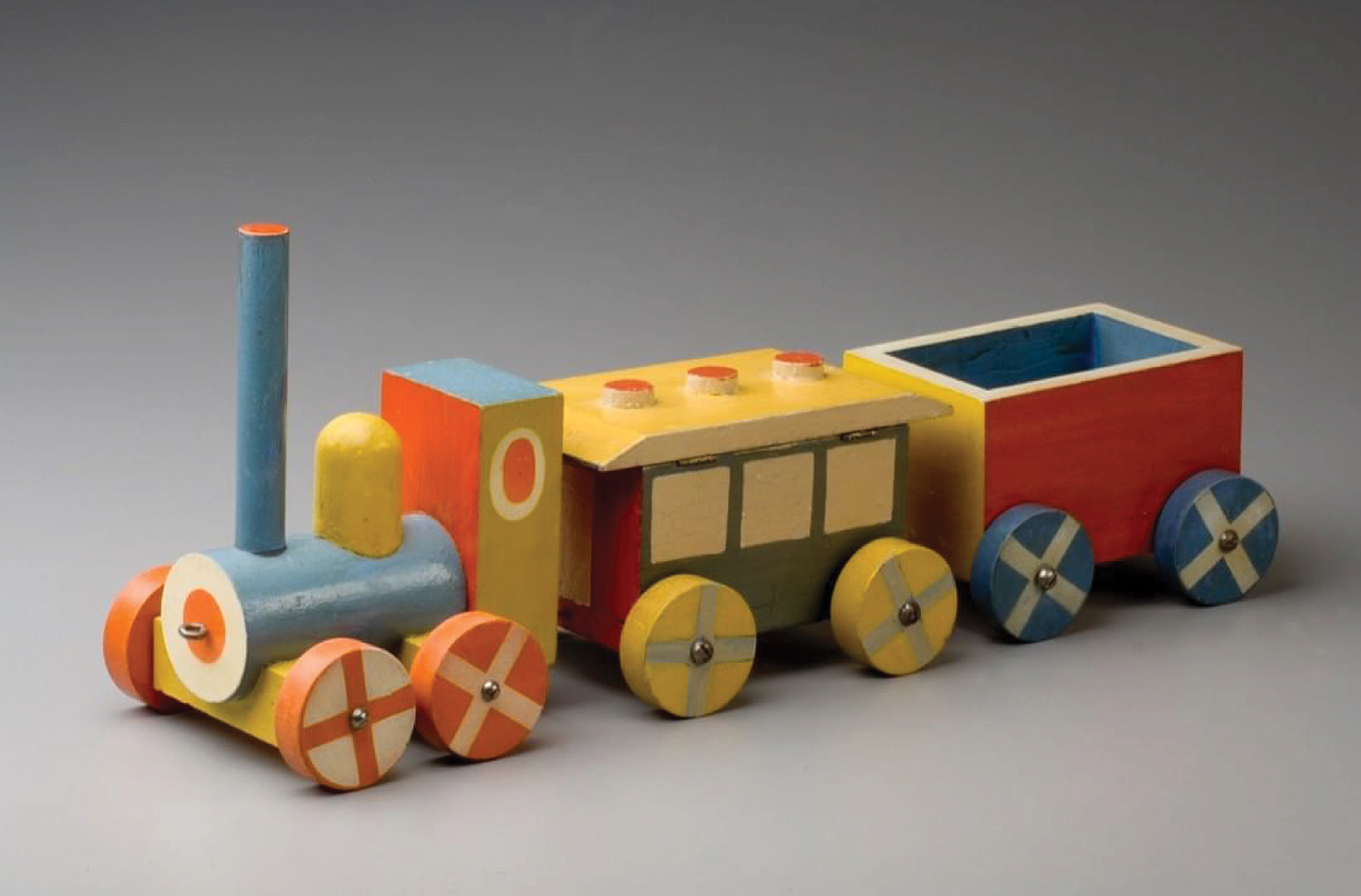 wooden toy train designed by Ladislav Sutnar