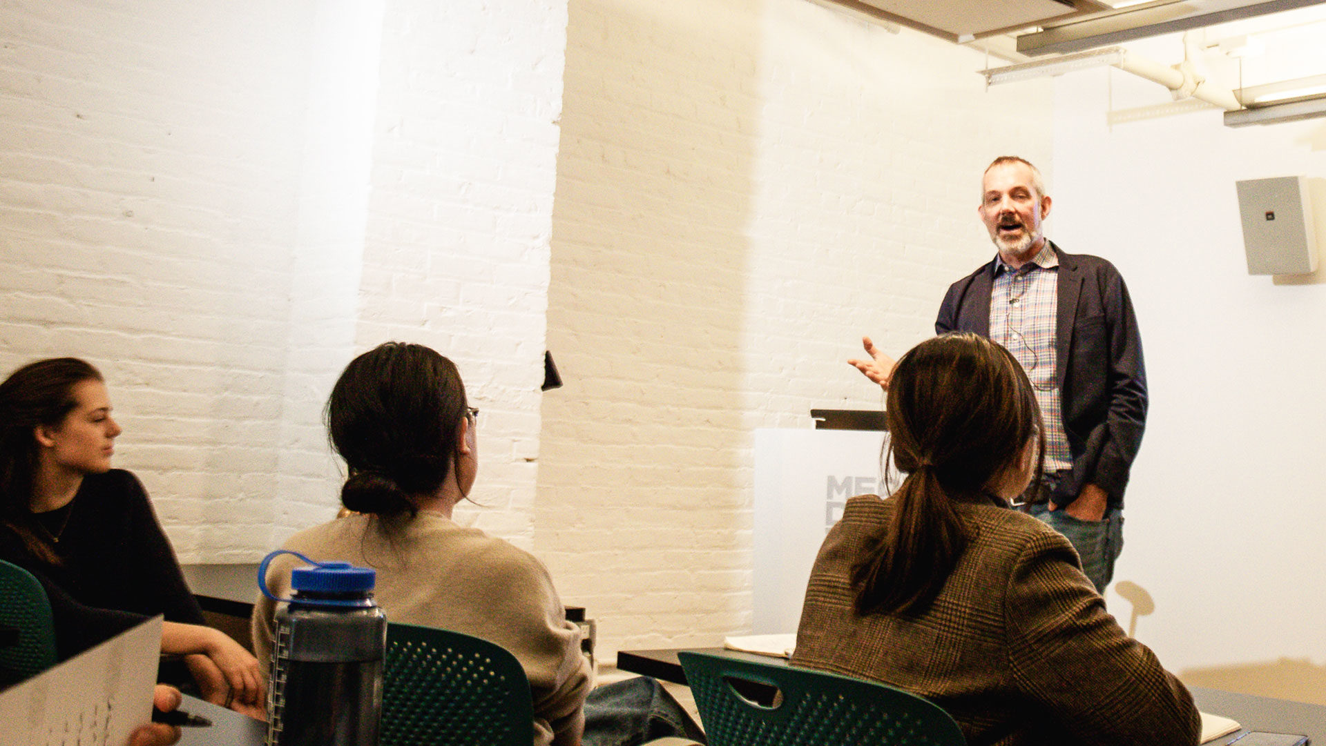 Josh Clark speaking to students