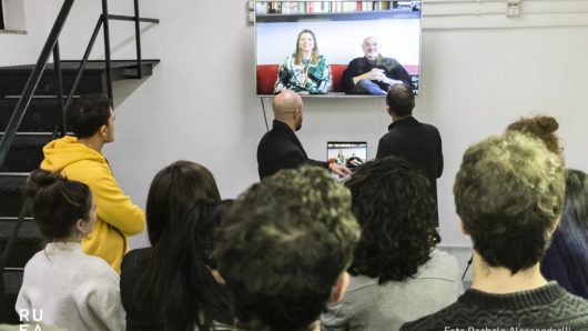 Steve Heller and Lita Talarico video chatting with people through TV