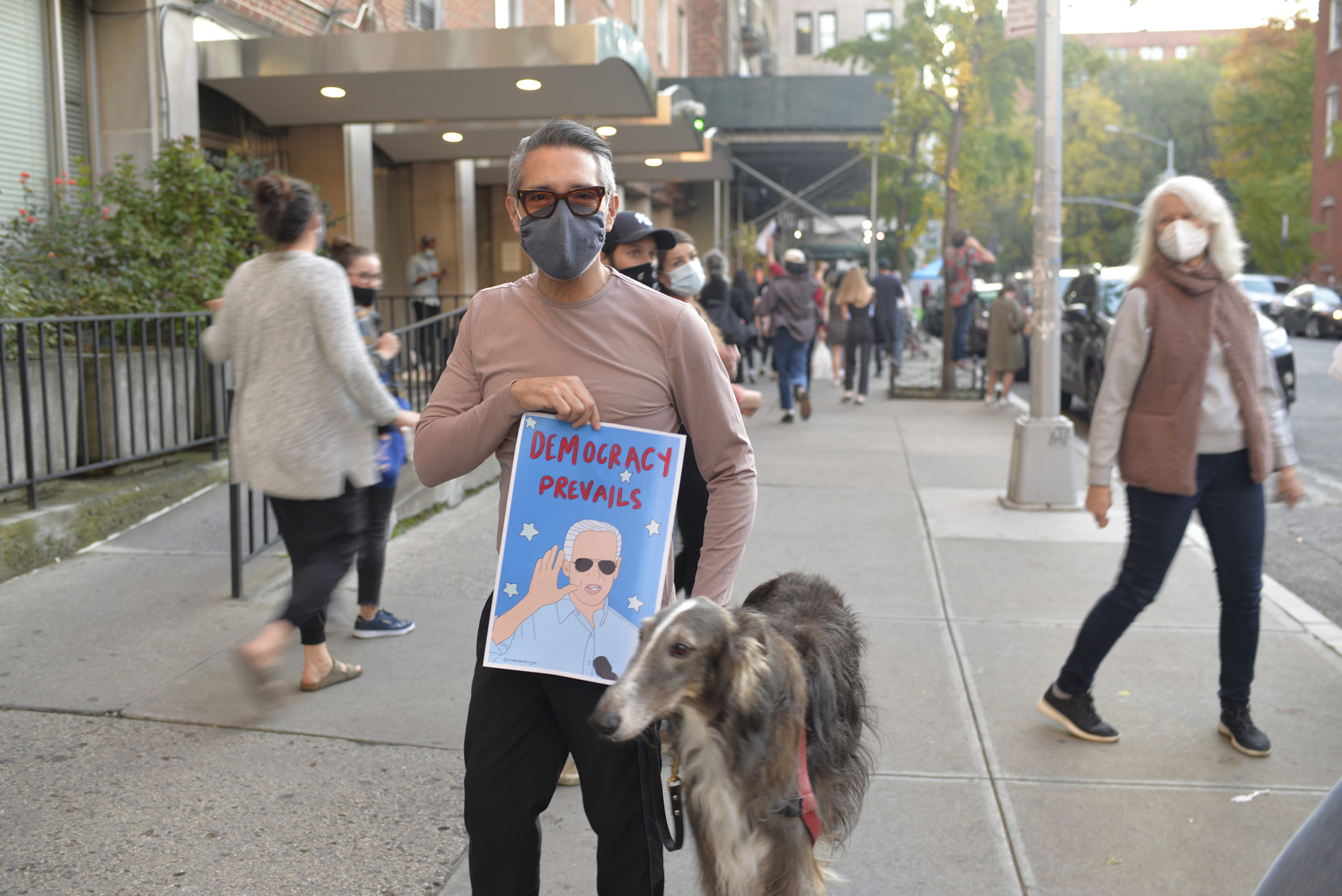 Man with the Joe Biden poster