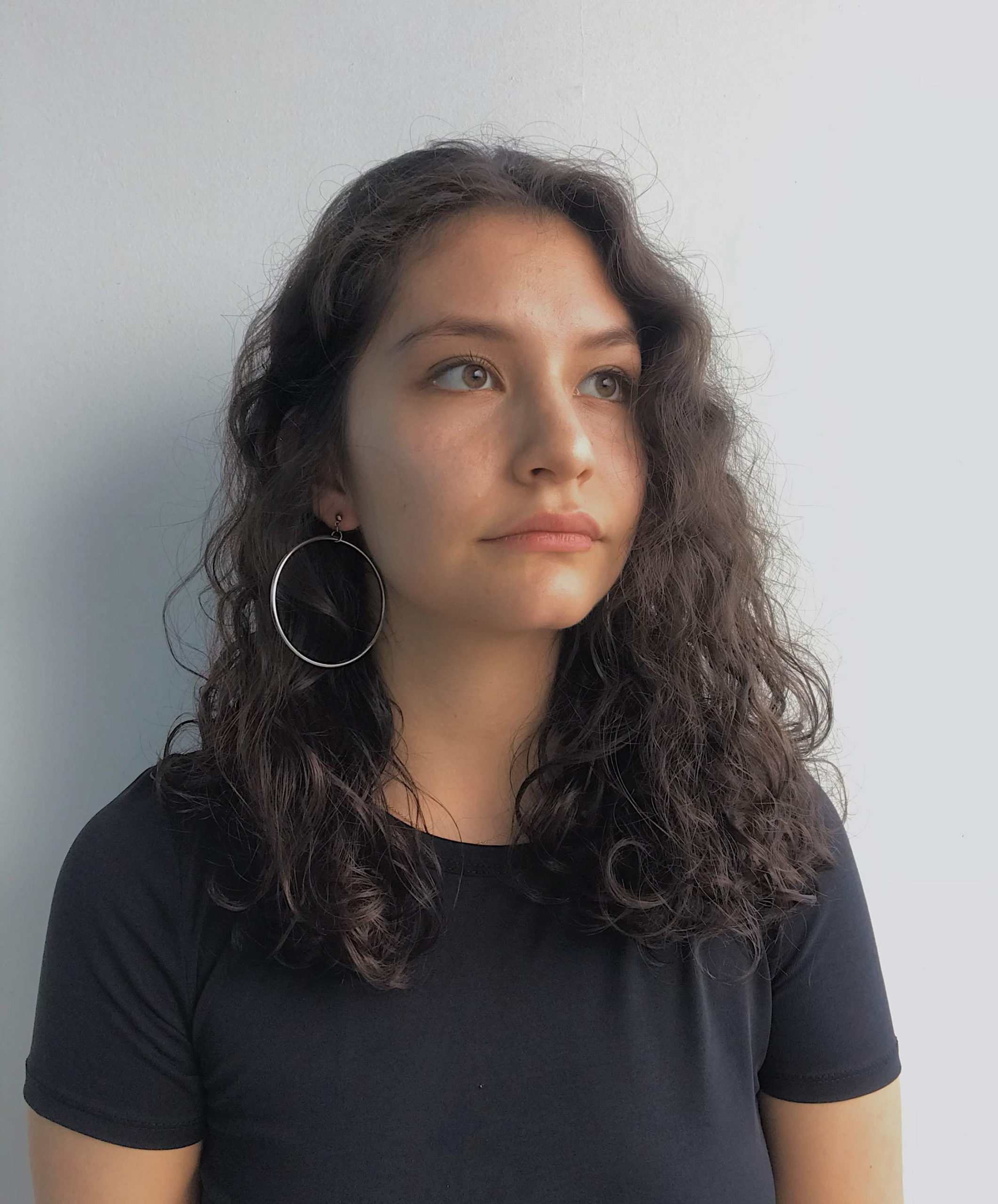 Brunette woman with black shirt, student Domenica Cevallos