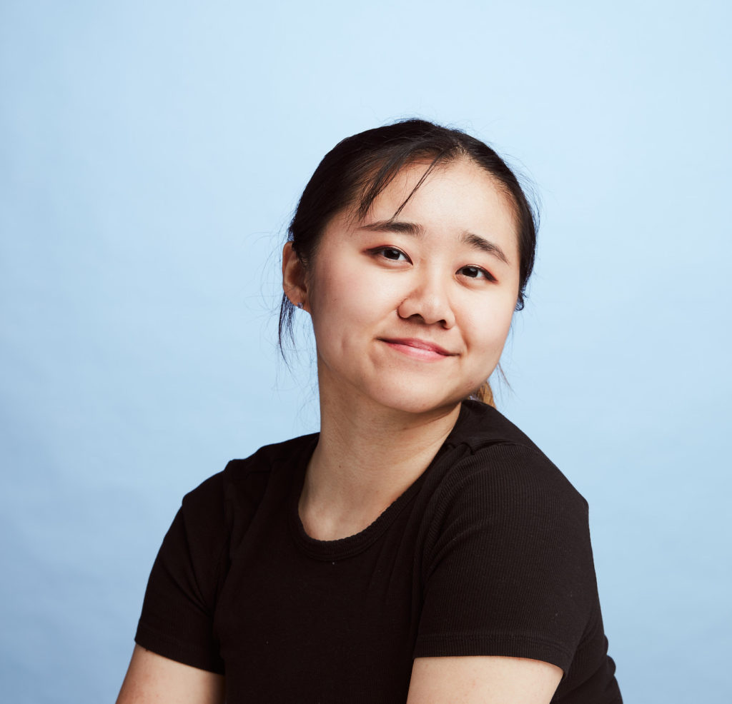 brunette woman with black shirt, student Jasmine Chan