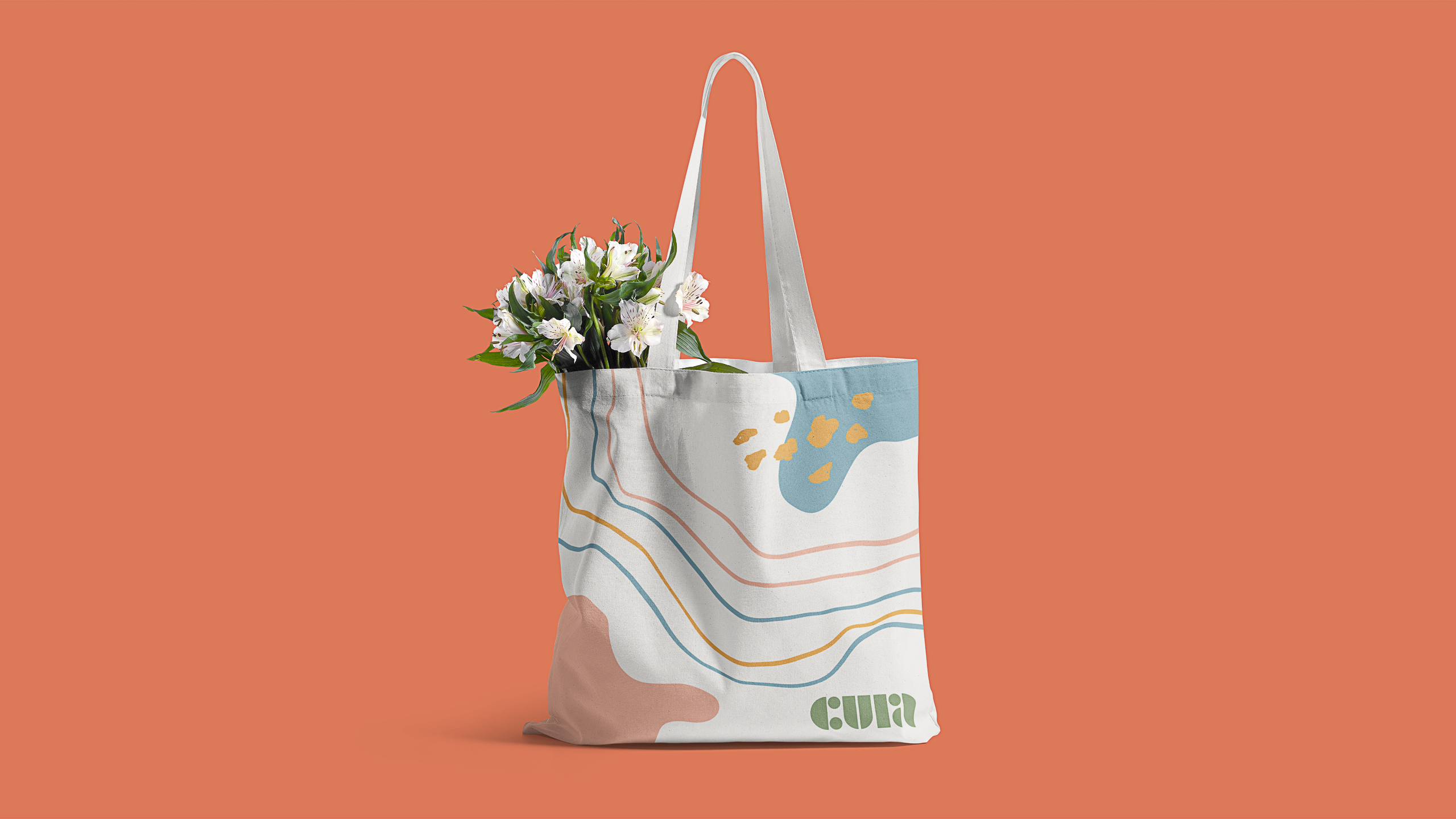 handbag with Cura logo and flowers