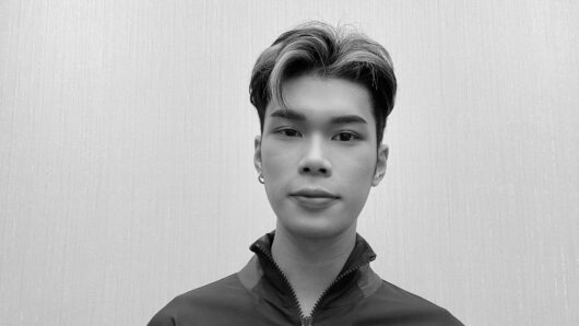 asian man in black and white photo