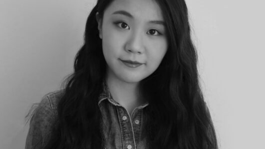 asian woman in black and white photo