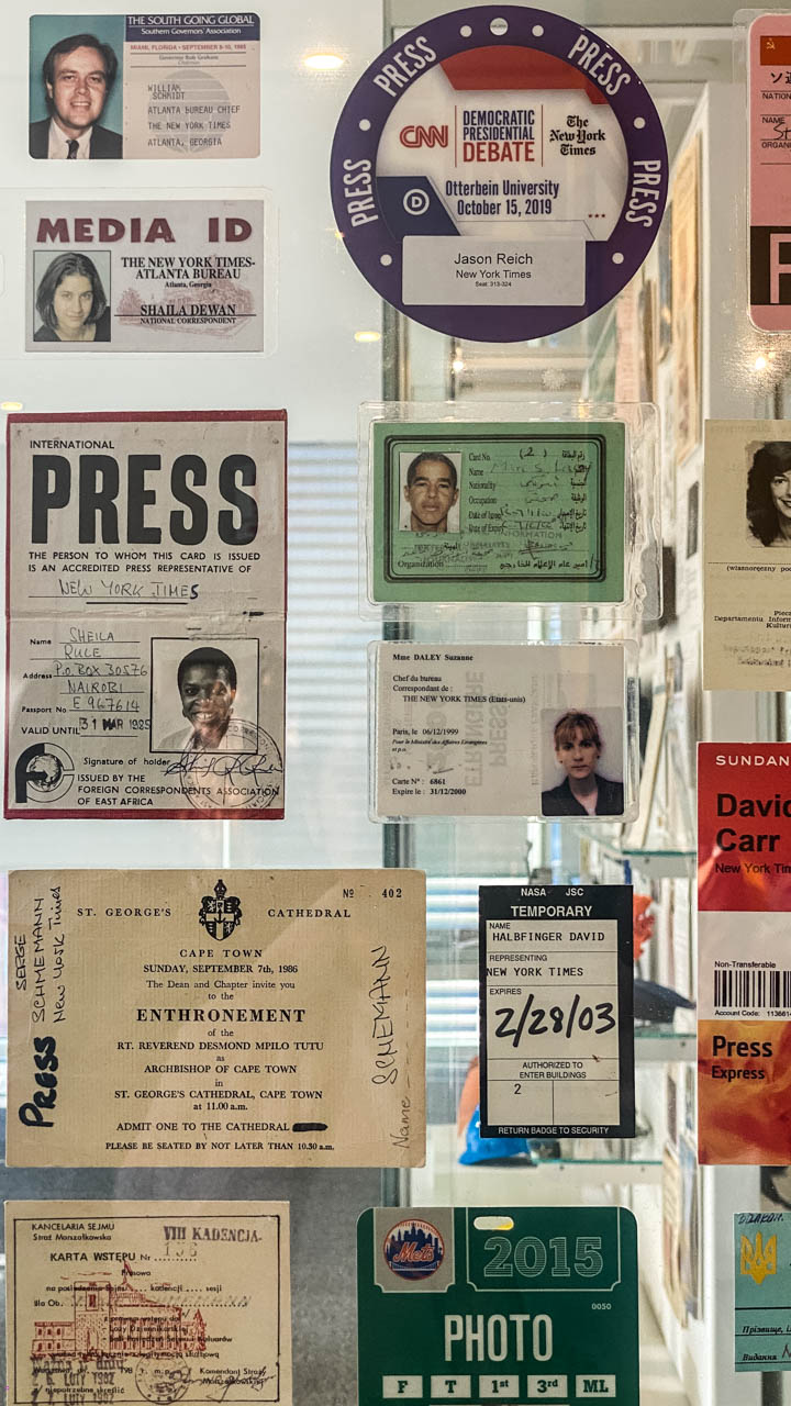 Photo of press credentials of old New York Times journalists