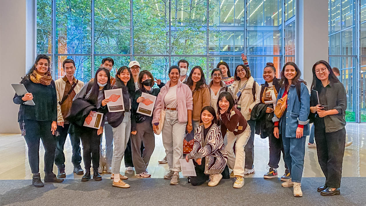 A group photo of students at the New York Times office