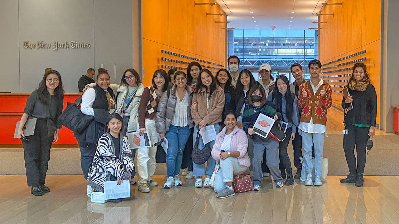 Posed group photo of students at the New York Times headquarters