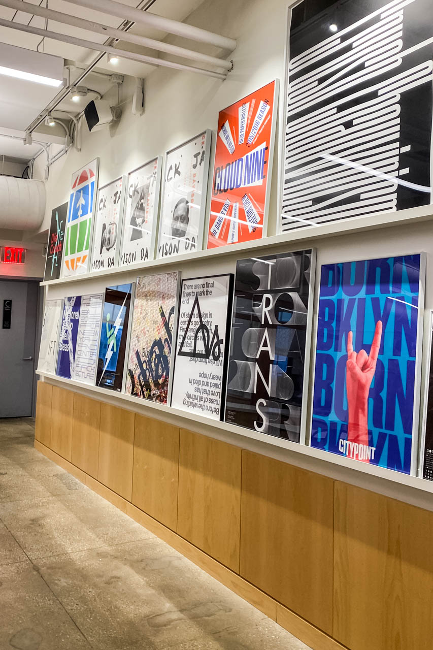 row of colorful framed posters at the Pentagram headquarters
