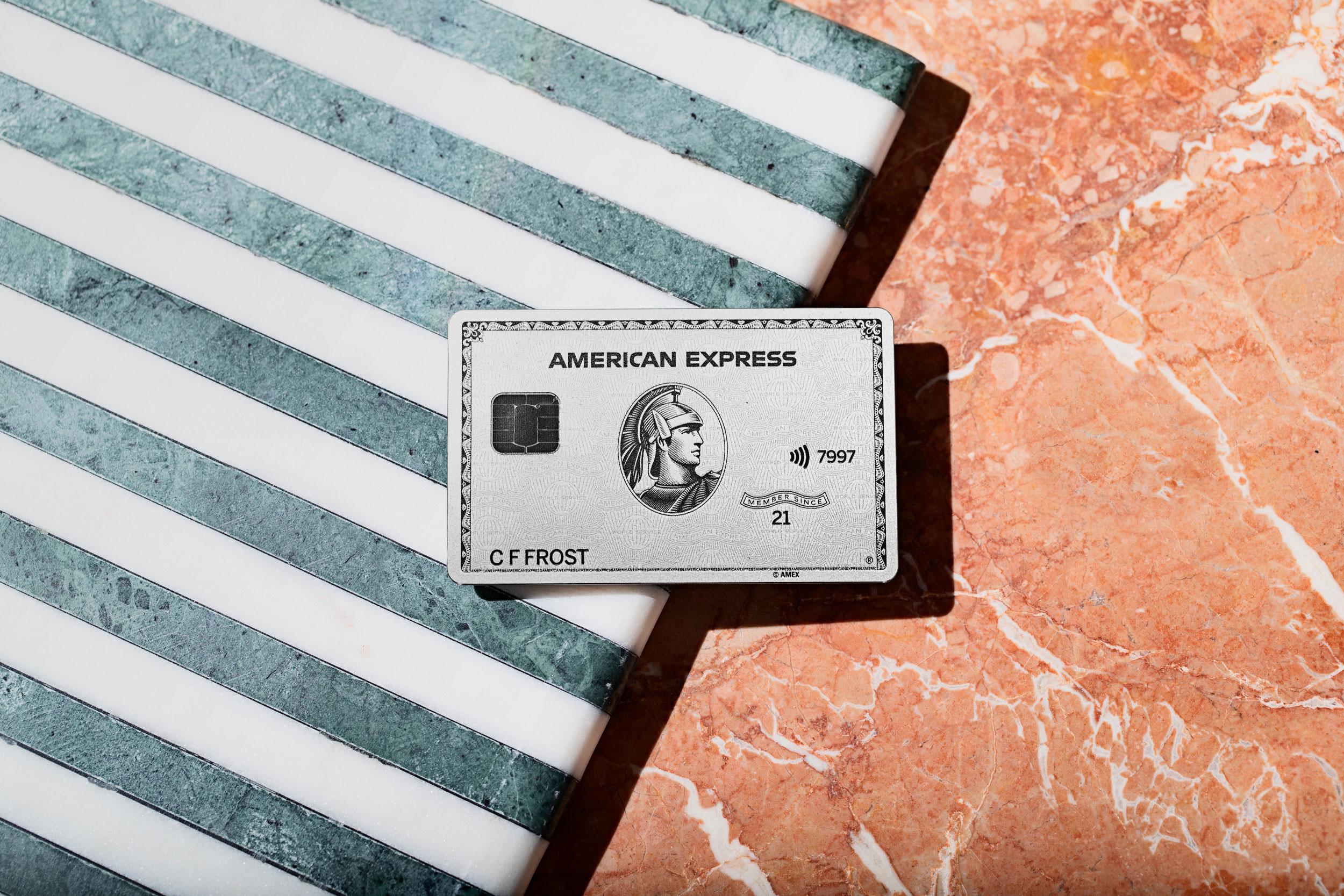 american express card on top for a marble and stripes cloth