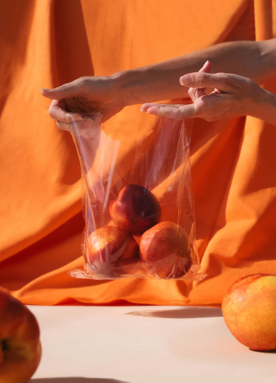 apples in a clear plastic bag