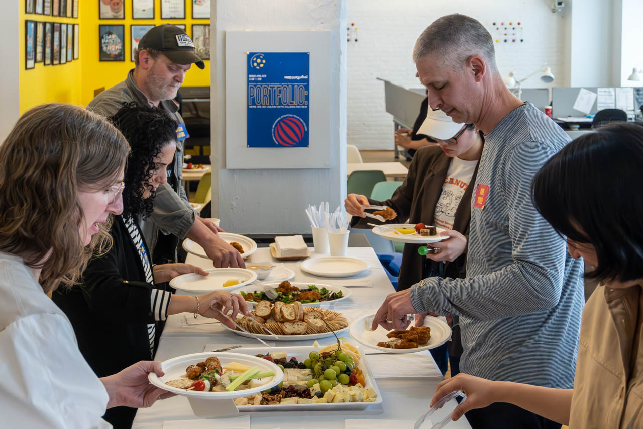 many people at a buffet table