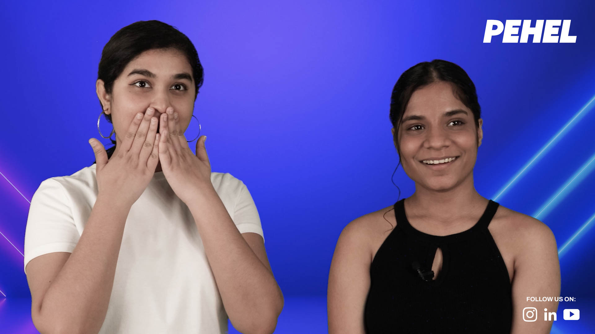 two people with a blue background