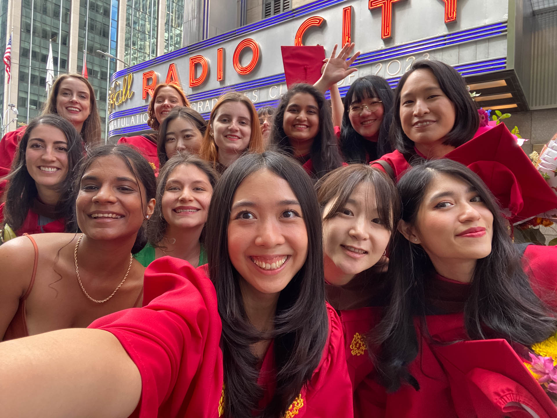 students taking selfies outside of Radio City Music hall