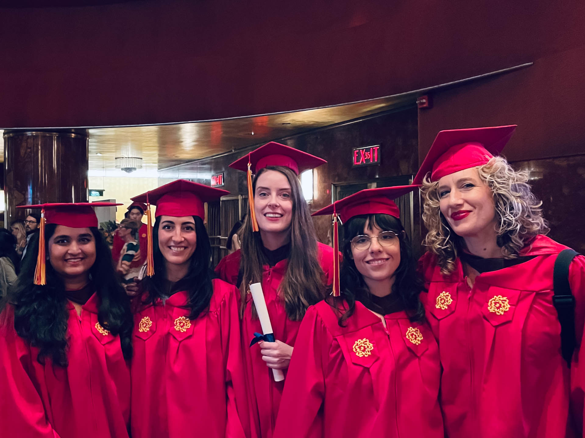 students in caps and gowns at Radio City Music Hall
