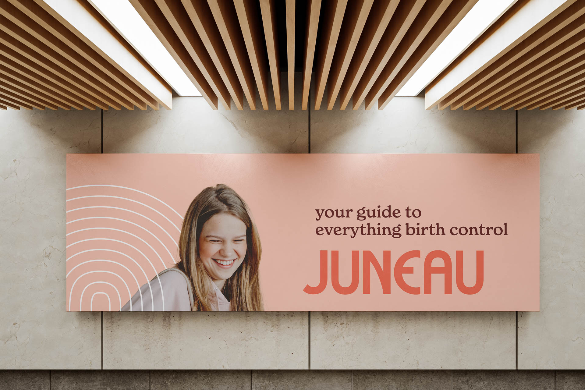 a street poster with Juneau ad on it