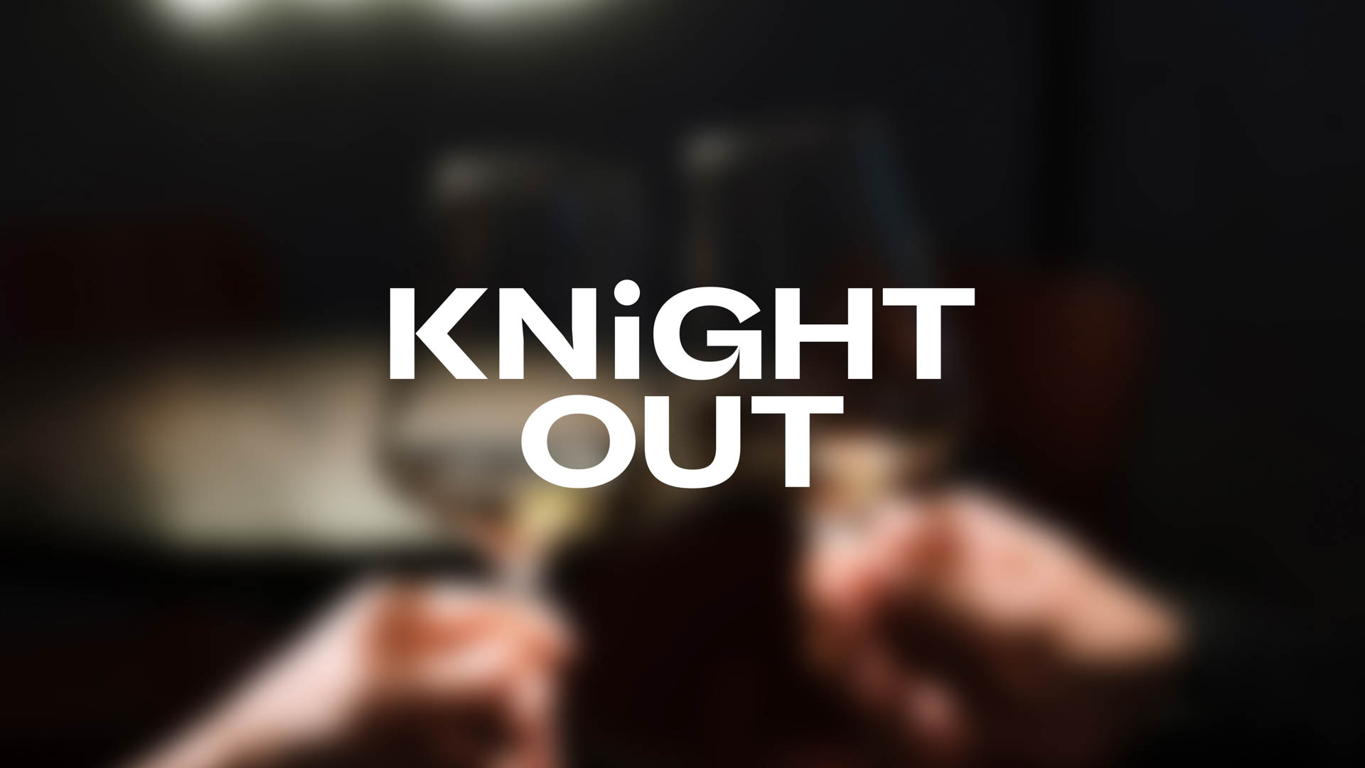 the knight out logo against a blurry background