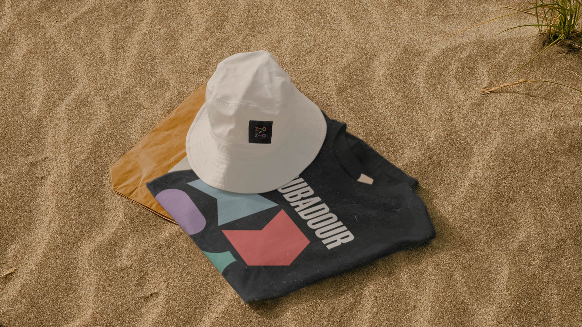 hat and shirt on a beach