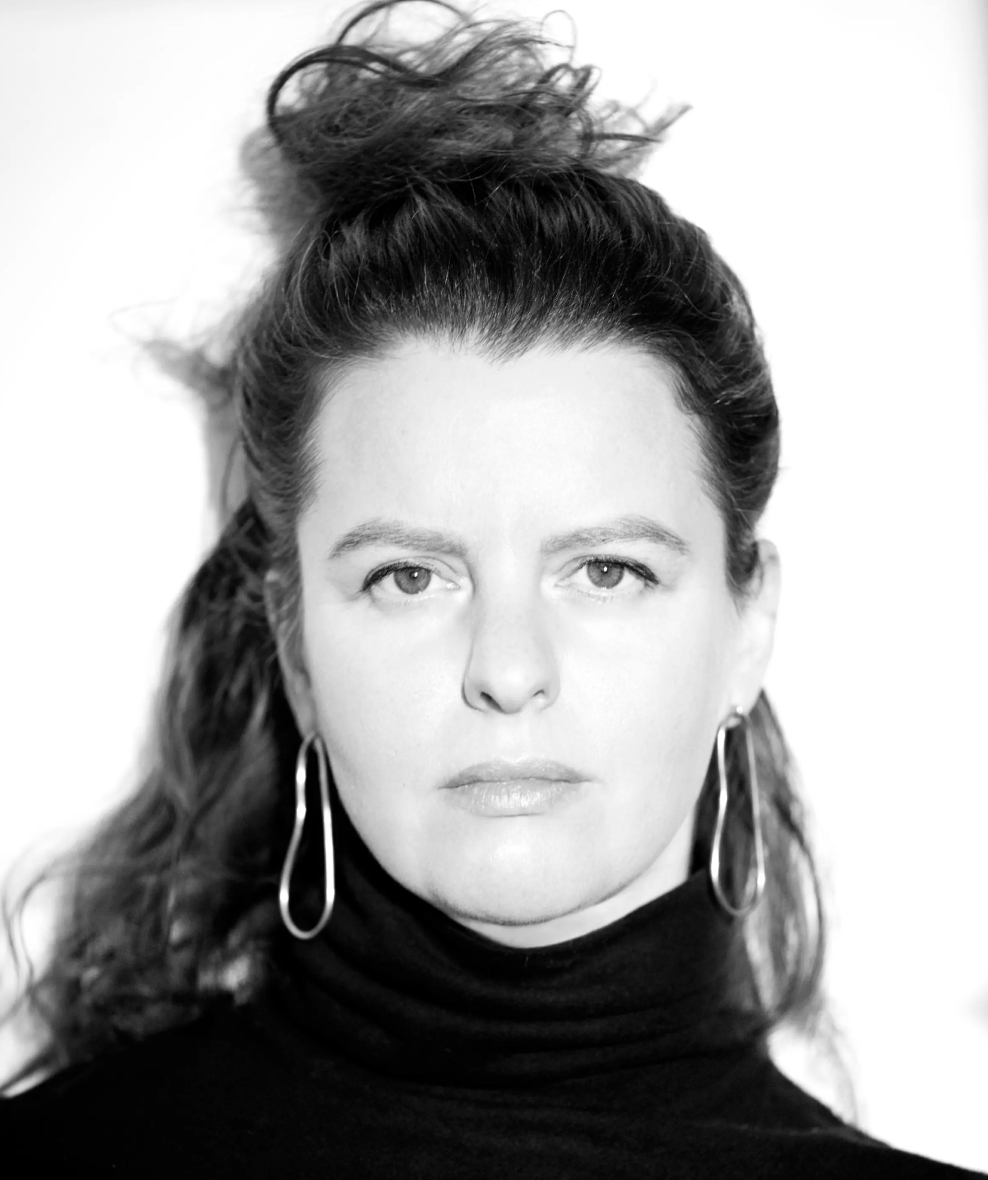 black and white portrait of a woman with long hair