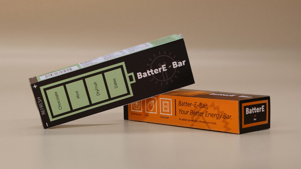 close up of energy bar boxes with turquoise and orange package design