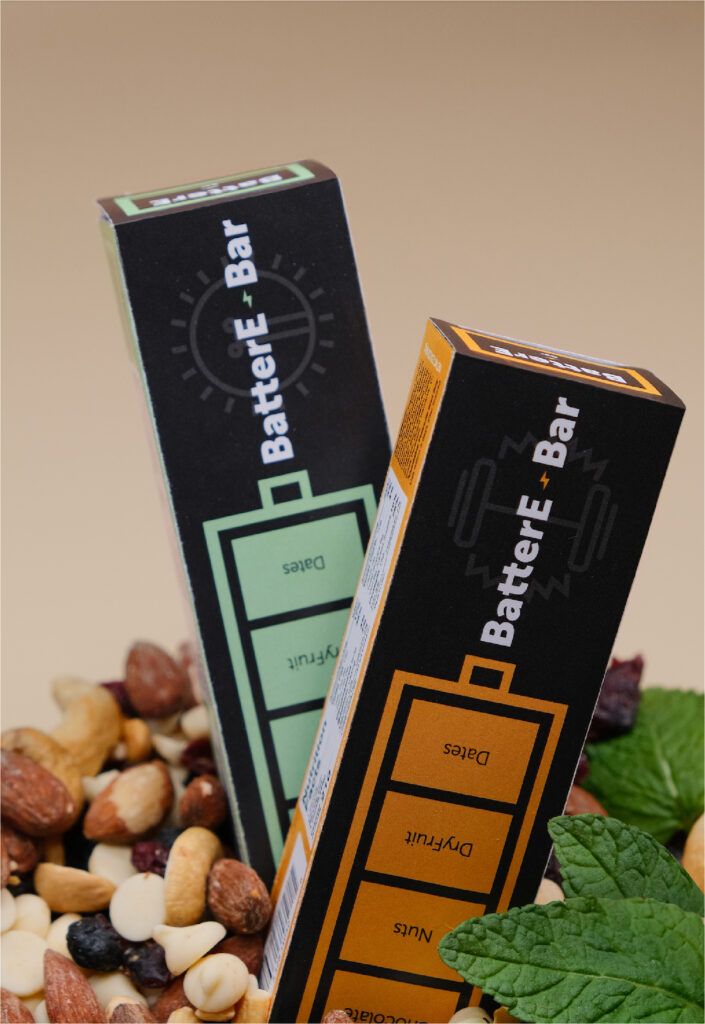 front of energy bar box with turquoise and orange packaging