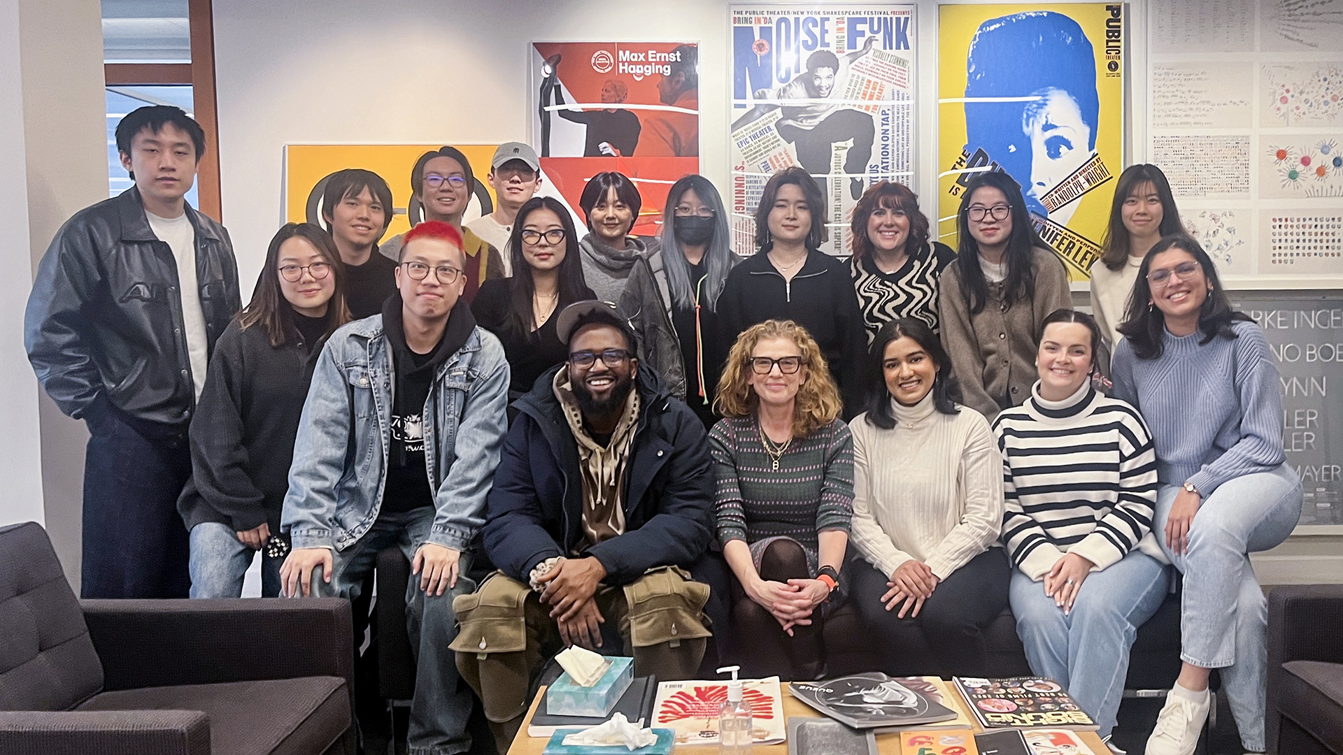 a group photo of students at the Pentagram studio in NYC