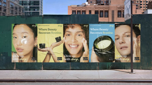 posters on a sidewalk wall showing the Dewy venture project