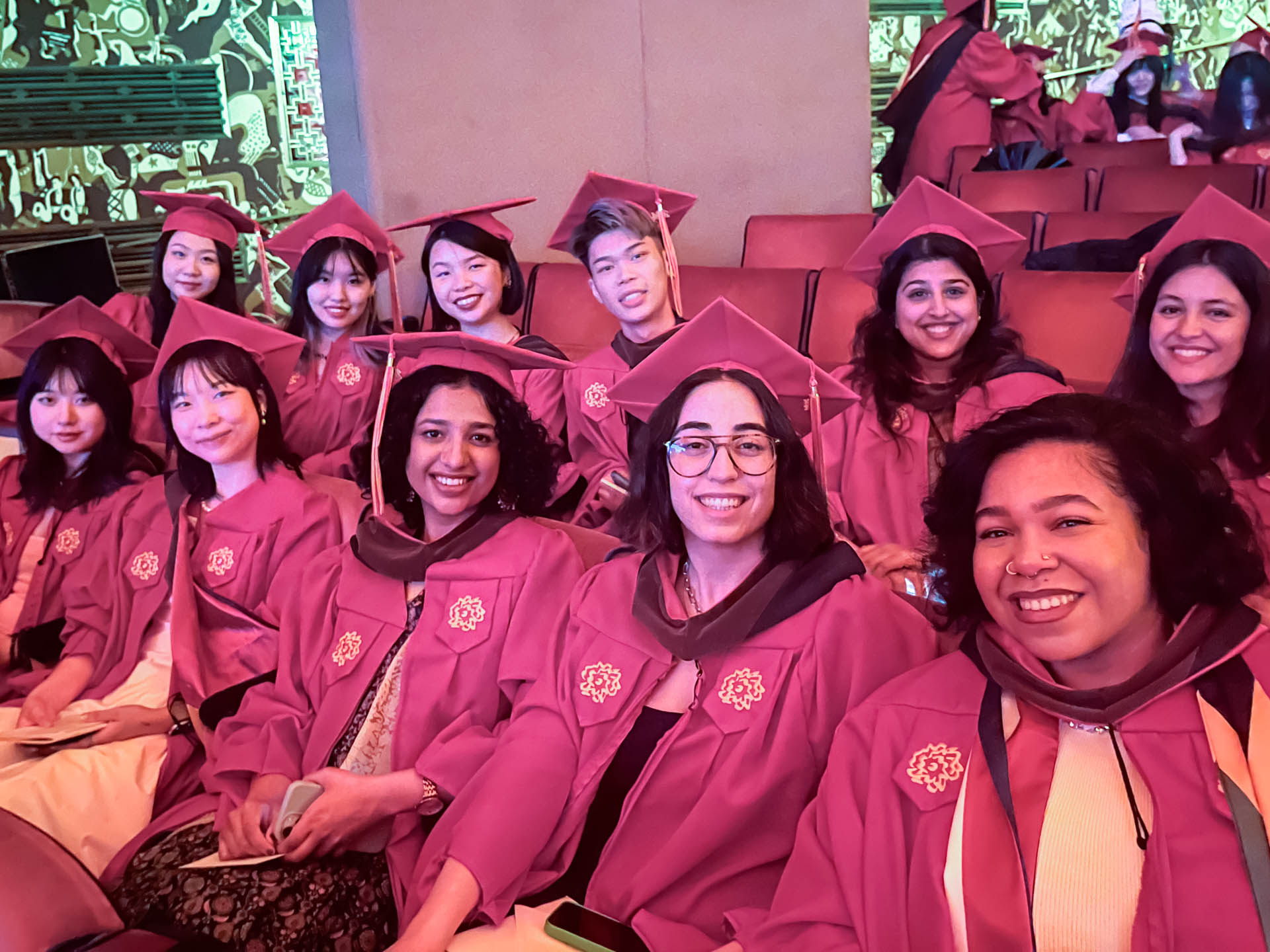 students waiting to get their diplomas at the graduation ceremony