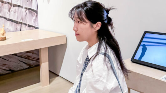 profile photo of Woman with long hair and white shirt