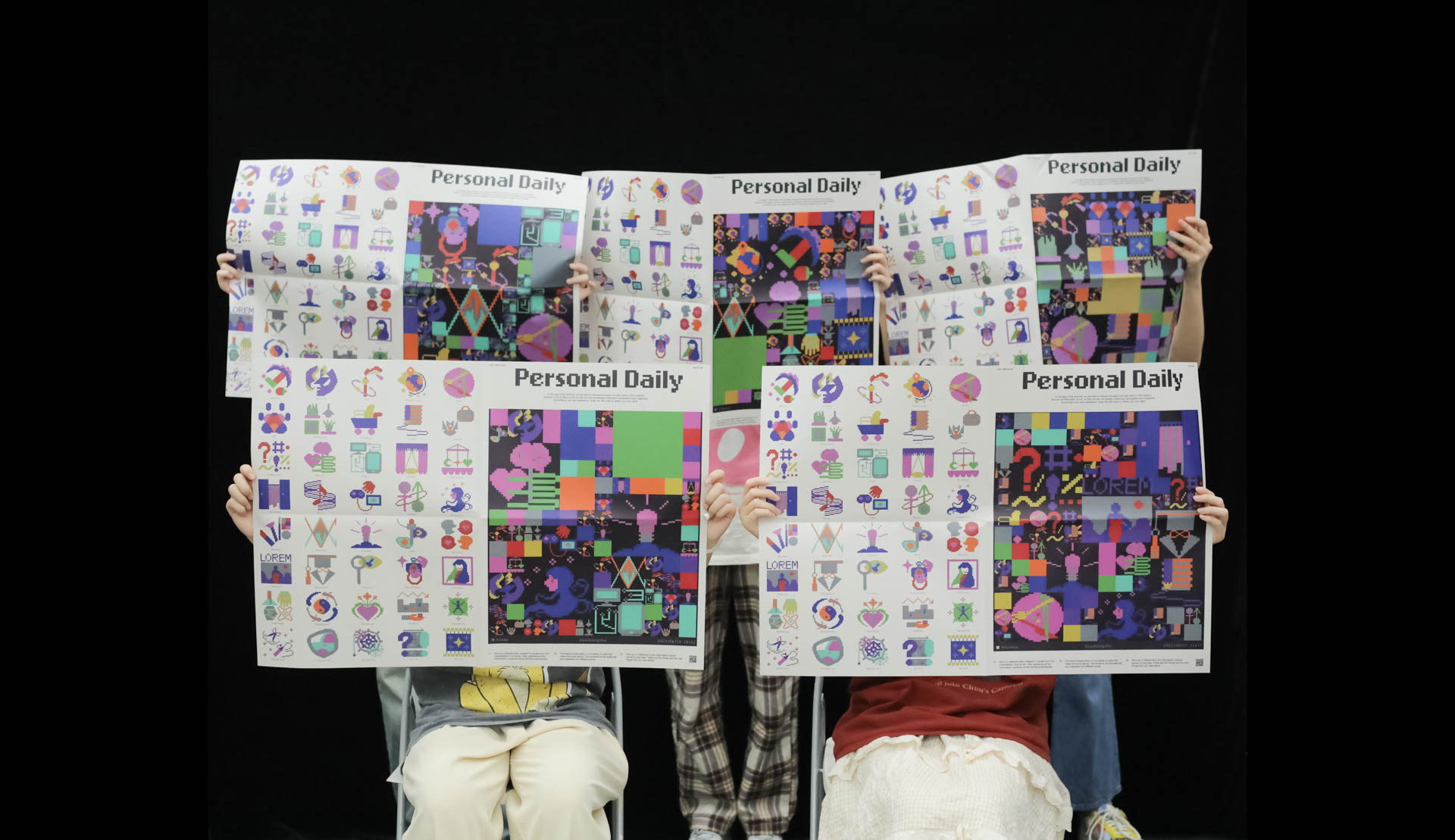 two people holding opened newspapers in front of them