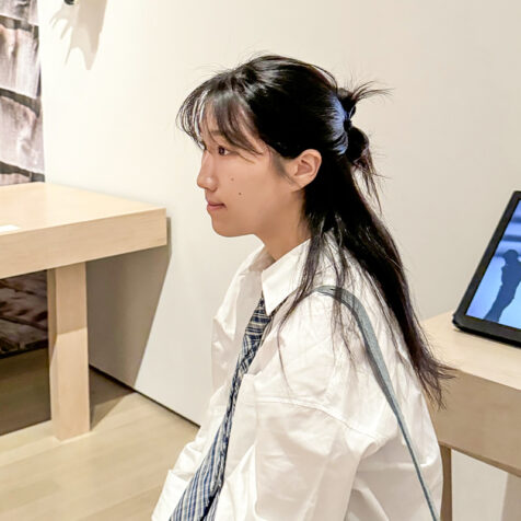 profile photo of Woman with long hair and white shirt