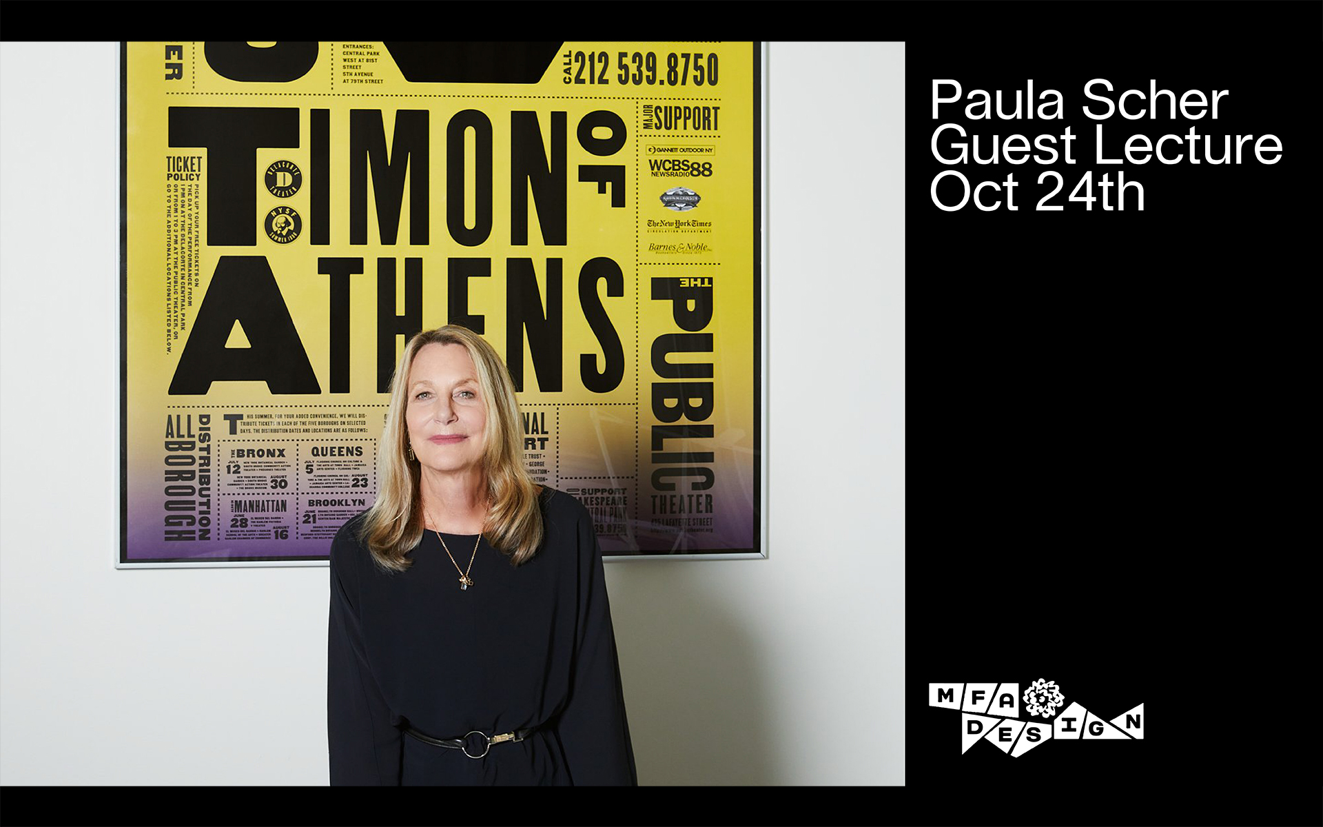 Designer Paula Scher standing in front of a large poster she designed