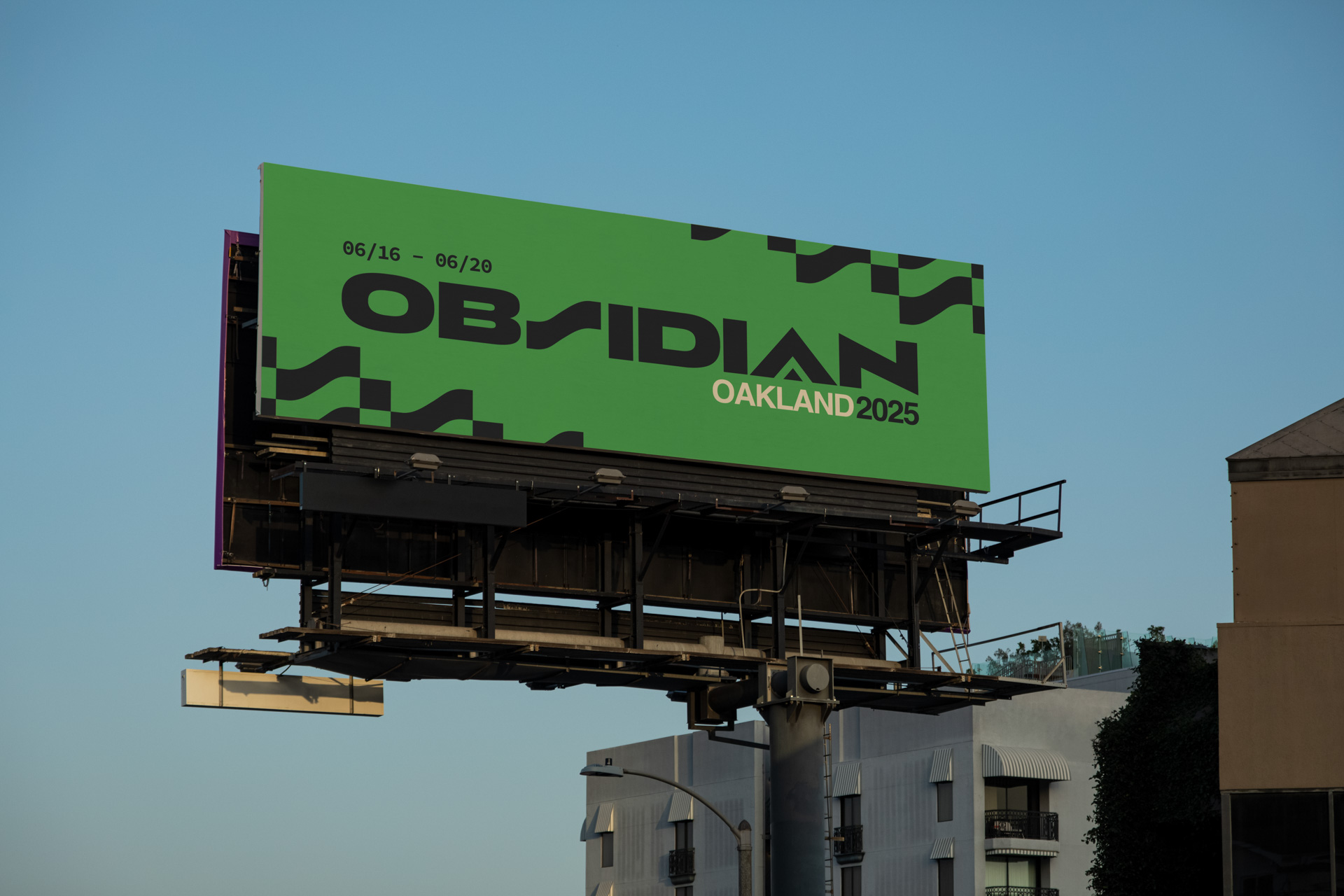 a bllboard at roof level. On the billboard it says Obsidian, with a green background