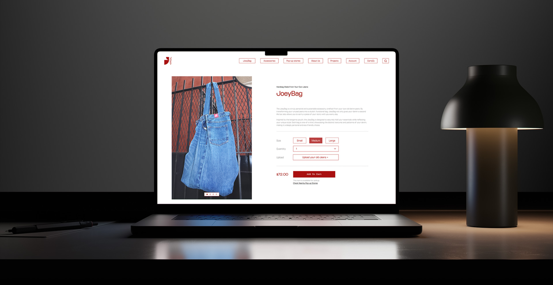 a laptop on a table. on the screen is a bag made of used jeans