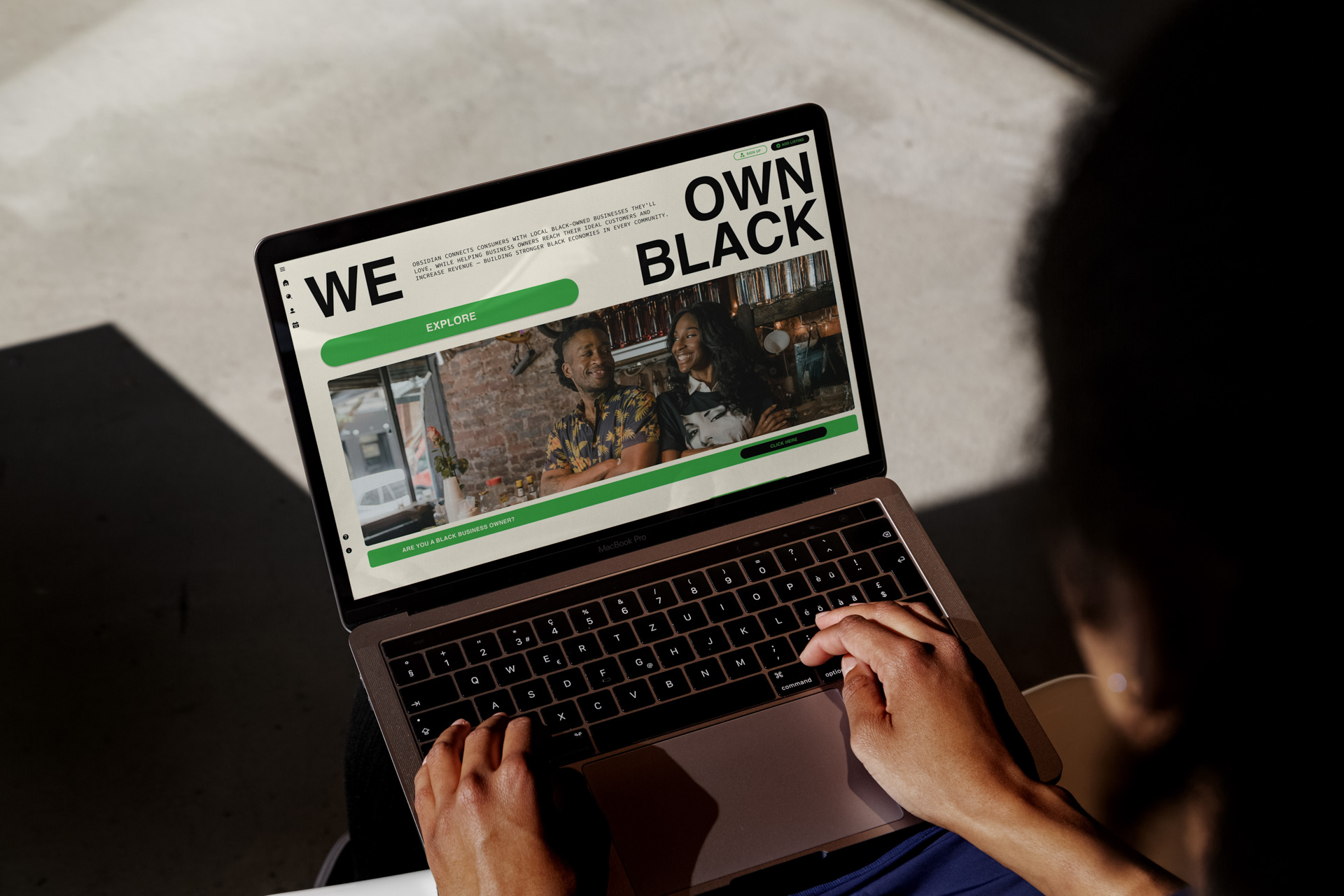 a laptop computer on someone's lap with the words " We Own Black"