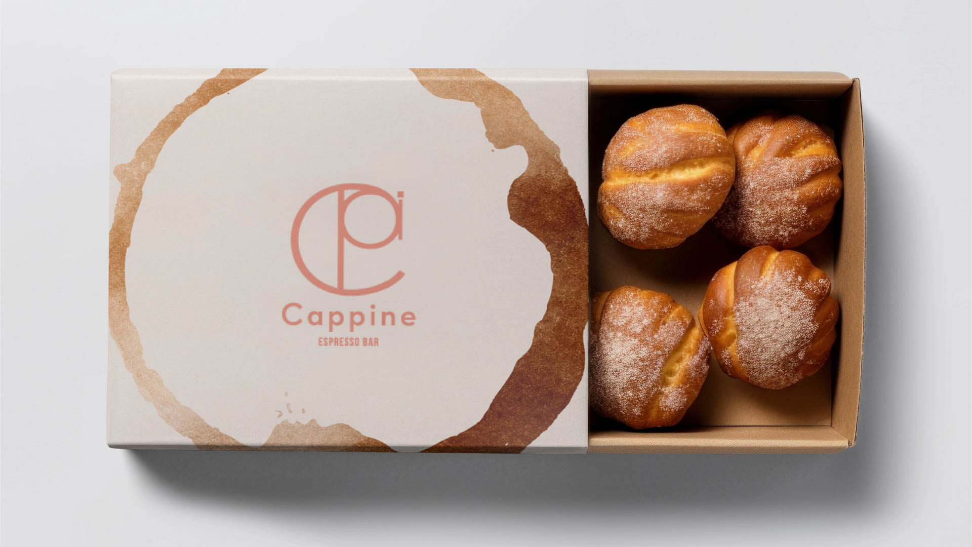 a box with a logo and illustration. Pastries in the box