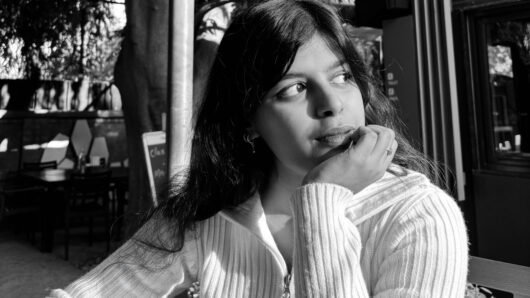 black and white portrait of a woman looking off camera
