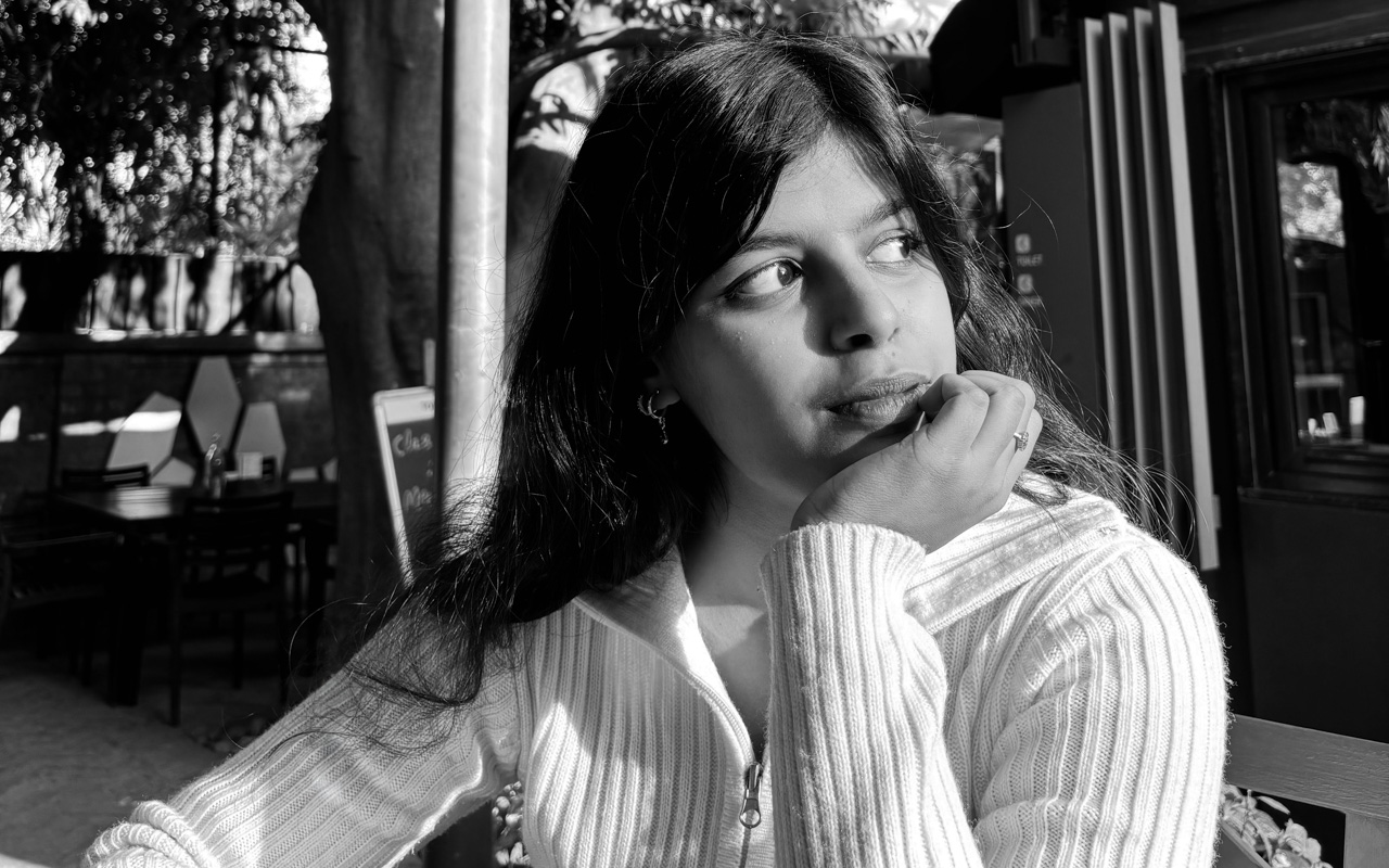 black and white portrait of a woman looking off camera