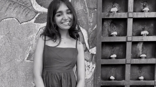 black and white portrait of a smiling woman