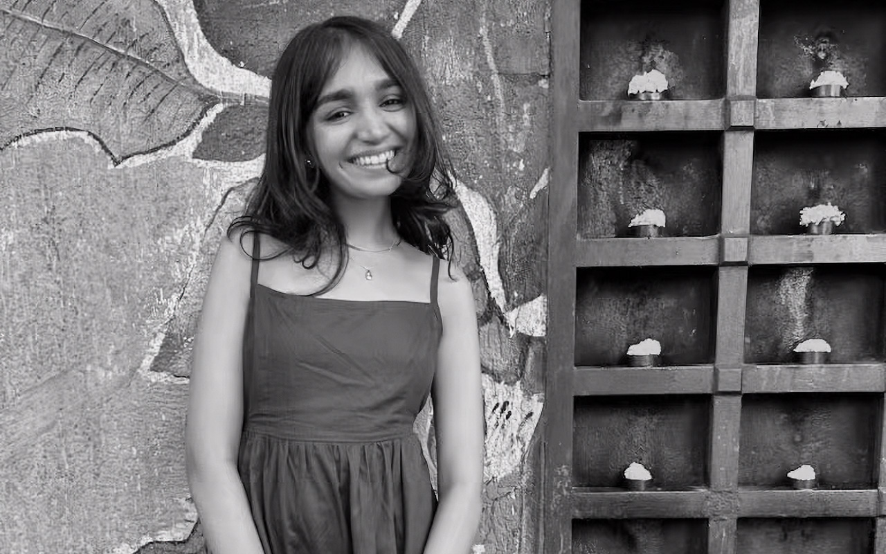 black and white portrait of a smiling woman