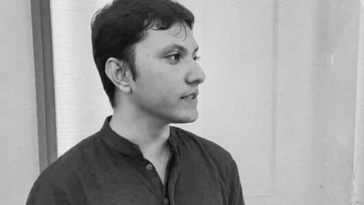 black and white portrait of a man looking off camera