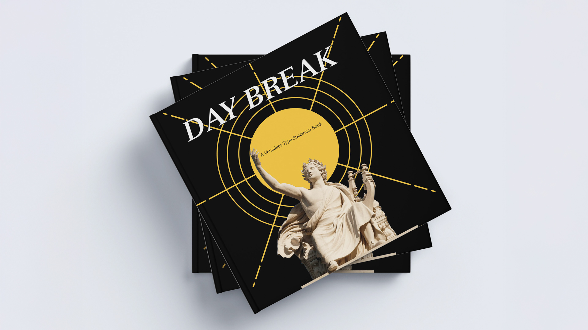 square books on a table, illustrations and the text Day Break